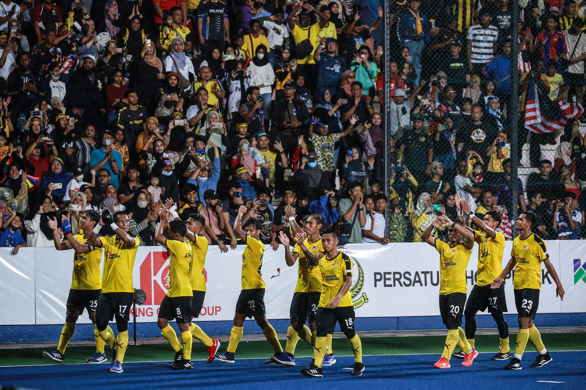 Victory lap by the Malaysian team honouring the fans